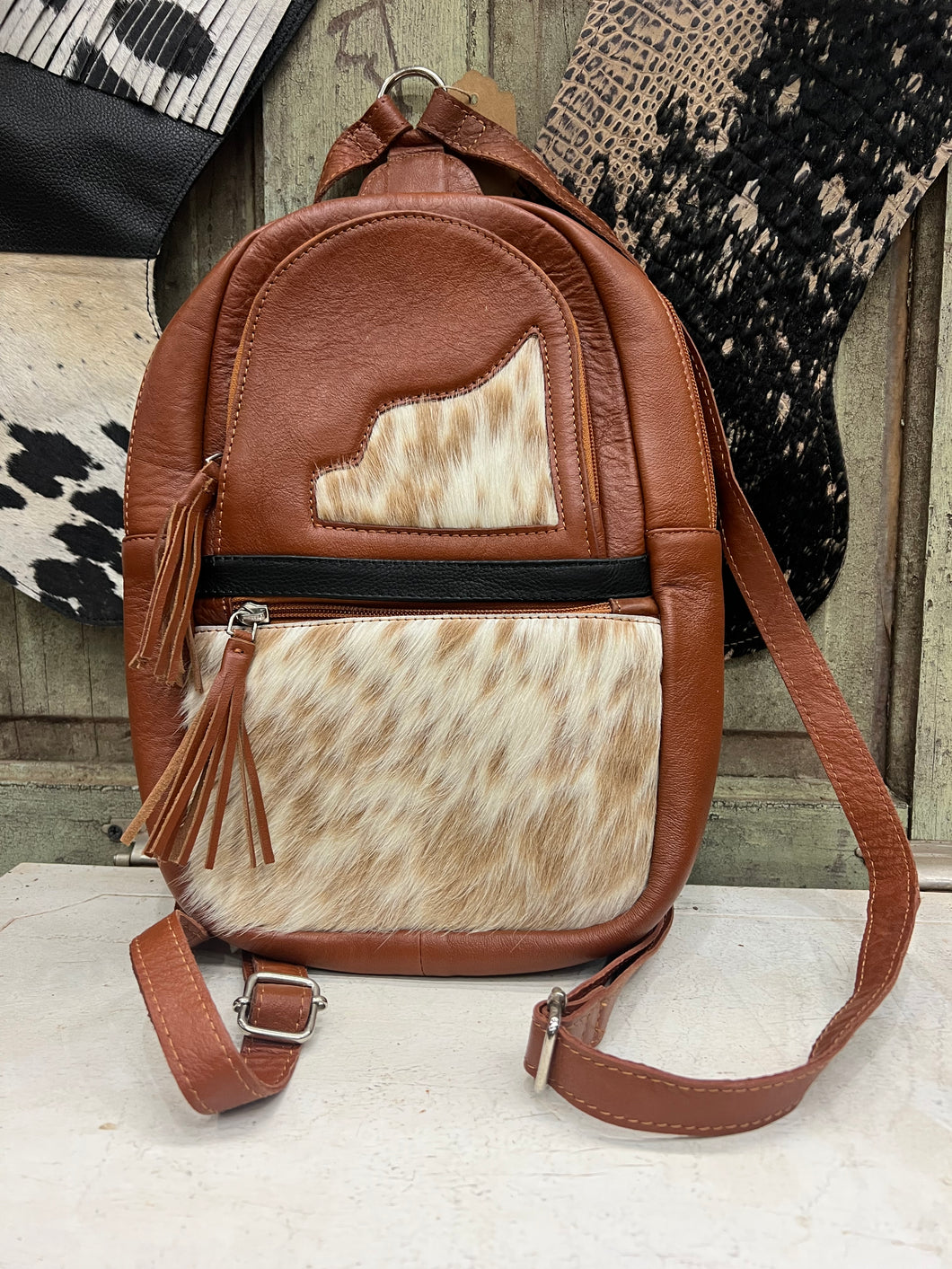 Brown leather/cowhide small backpack
