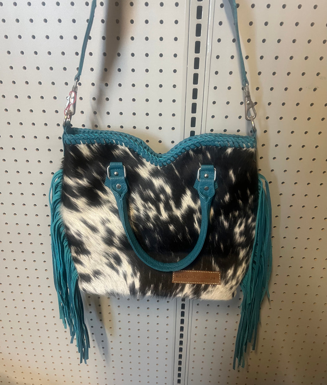 Cowhide purse, blue fringe