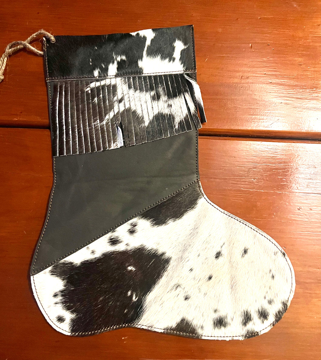 Cowhide stocking dk. Brown/white with fringe