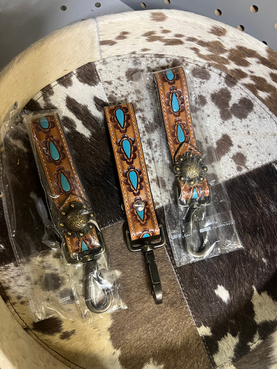 Tooled “turquoise” leather keychain