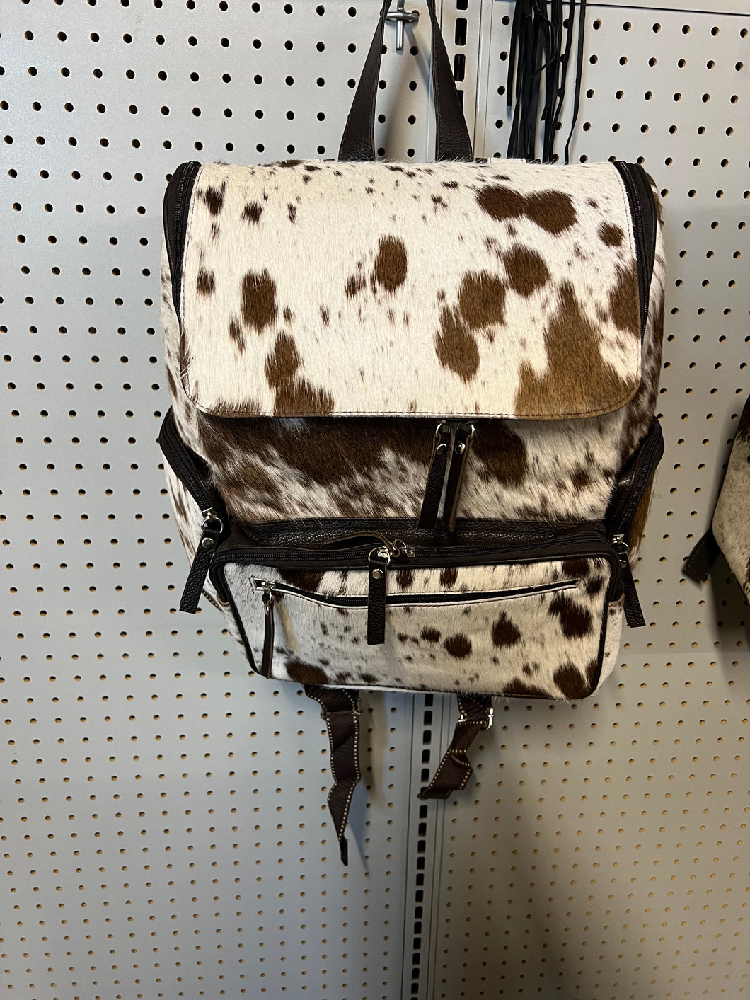 Large brown cowhide backpack