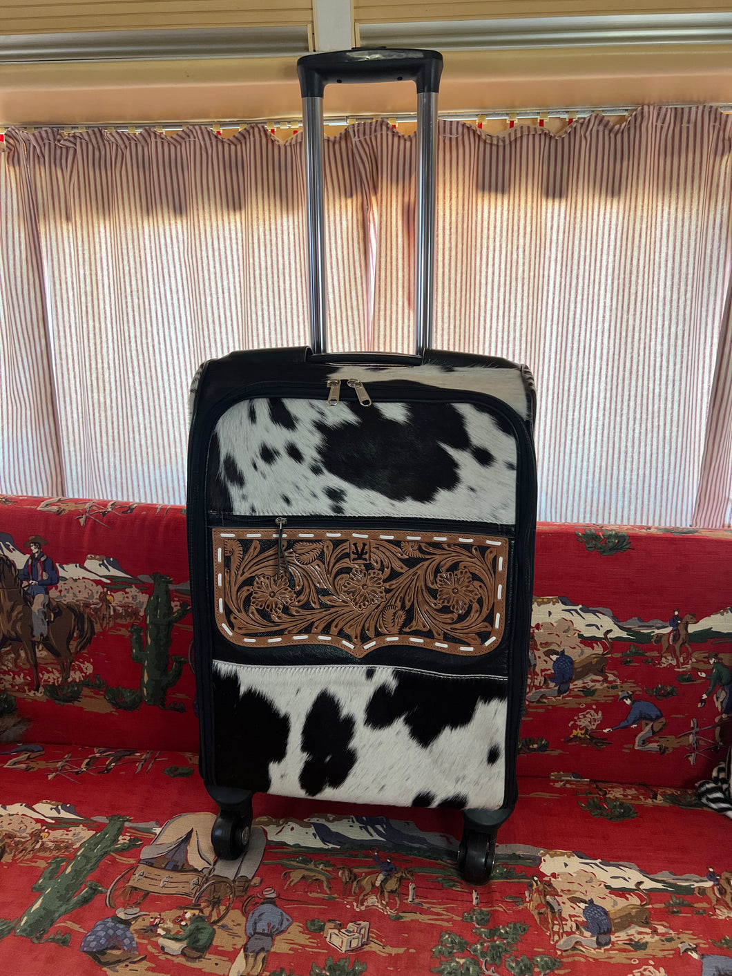 Black/white Cowhide rolling suitcase